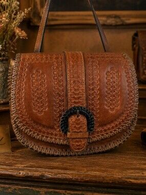 Patricia Nash Hand‑Tooled Brown Leather Saddle Crossbody Bag
